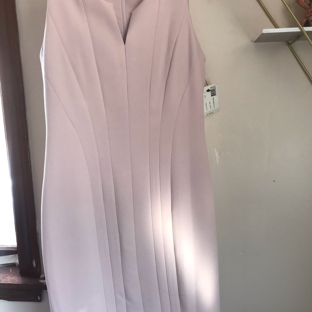 Business/casual knee length dress.
